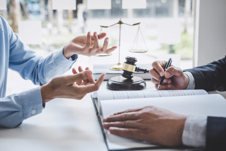 Medical negligence solicitor and client discussing missed fracture claims