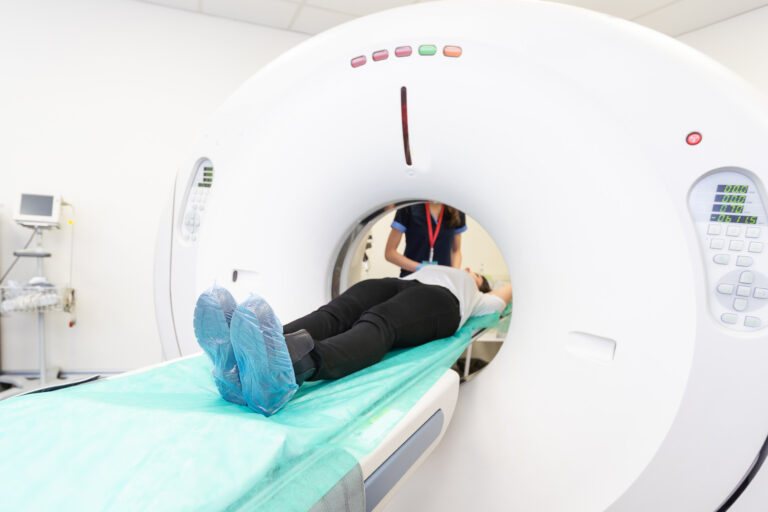 A patient receives a CT scan after experiencing a cancer misdiagnosis